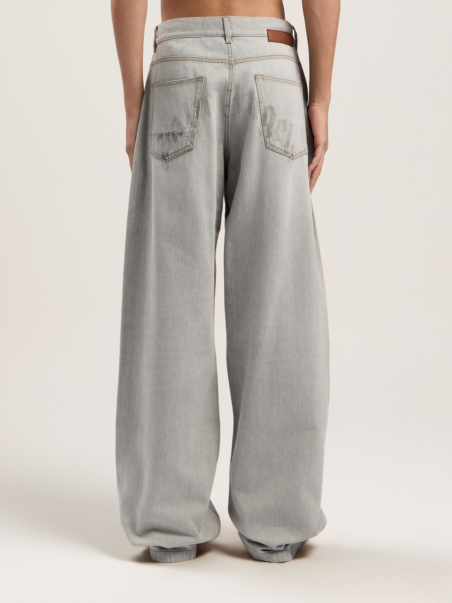 curved logo loose denim pants