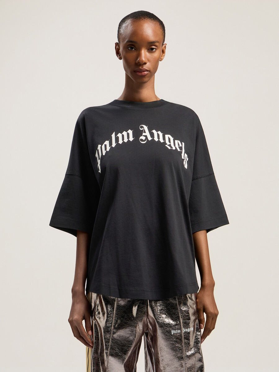 curved logo over tee