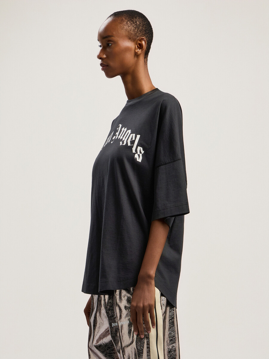 curved logo over tee