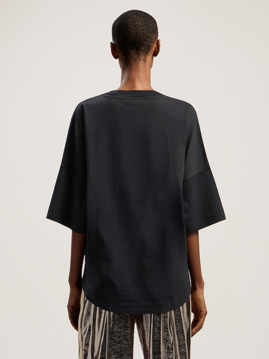 curved logo over tee